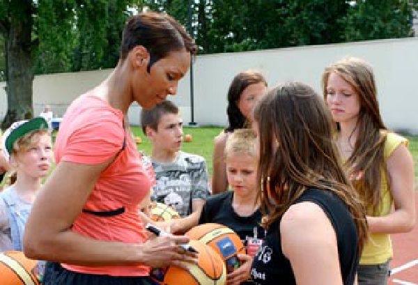 Olympia Scott Signing Autographs for Kids in Latvia olympia-signs-autographs